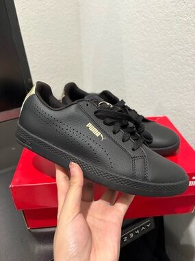 Puma Black Sneakers with Gold Logo